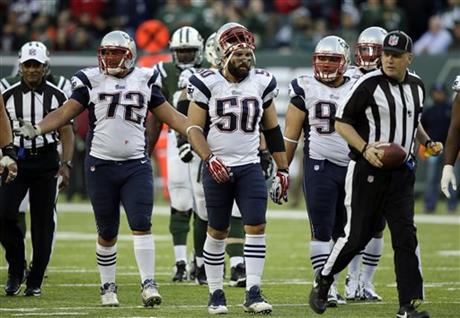 New England Patriots' Joe Vellano (72), Rob Ninkovich (50) and Chris Jones (94)