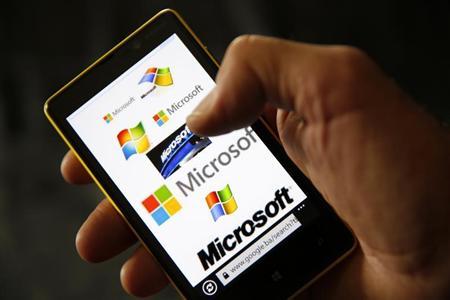 A Nokia Lumia 820 smartphone with Microsoft logos on the screen is shown in a photo illustration taken in the central Bosnian town of Zenica