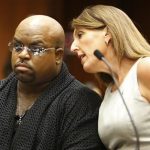 Grammy Award winning R&B singer and "The Voice" TV judge Green confers with attorney Berk in criminal court in Los Angeles