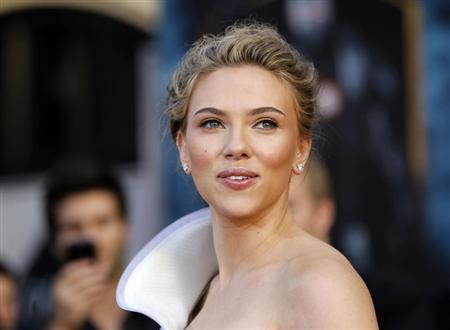 Johansson poses at the premiere of the movie "Iron Man 2" at El Capitan theatre in Hollywood
