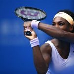 Serena Williams of the U.S. returns the ball during her match against Maria Kirilenko of Russia at the China Open tennis tournament in Beijing
