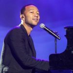 John Legend performs at the annual shareholders meeting for Walmart in Fayetteville, Arkansas