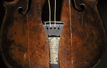 File photograph shows the violin that belonged to Titanic bandmaster Wallace Hartley on display at the Titanic Centre in Belfast