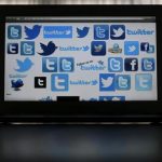An illustration picture shows Twitter logos on a computer screen in Frankfurt
