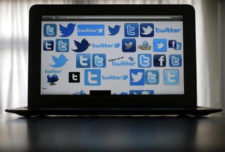 An illustration picture shows Twitter logos on a computer screen in Frankfurt