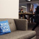 A pillow is placed on a couch at Twitter headuiarters in San Francisco
