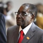 Zimbabwe's President Mugabe arrives for a meeting in Addis Ababa