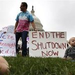 Federal workers demonstrate for an end to the U.S. government shutdown on the west front of the U.S. Capitol in Washington