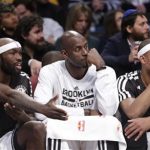 Andray Blatche, left, Kevin Garnett (2) and Paul Pierce
