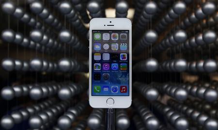 Apple's new iPhone 5S is displayed at an Apple shop in Tokyo's Ginza shopping district