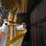 The new Archbishop of Canterbury Justin Welby knocks on the door of Canterbury Cathedral as he arrives for his enthronement ceremony, in Canterbury, southern England