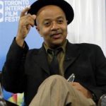 Author James McBride gestures during the "Miracle at St. Anna" news conference at the 33rd Toronto International Film Festival