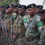 Congolese peacekeepers from the Multinational Force of Central Africa (FOMAC) listen to morning instructions from their commander at the FOMAC base in Bossangoa