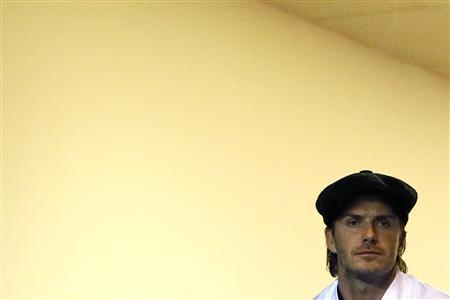 Former England footballer David Beckham watches the international rugby union match between England and Argentina at Twickenham in London
