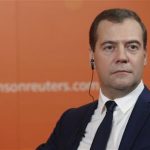 Russia's Prime Minister Dmitry Medvedev looks on during an interview with Reuters in Moscow