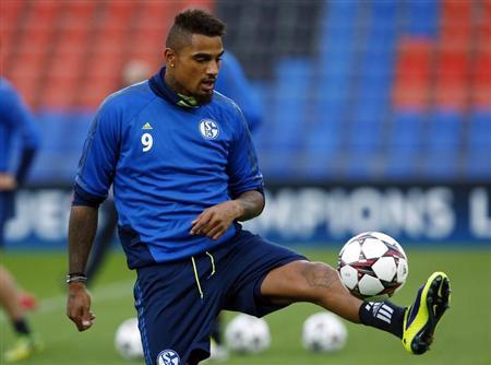 Schalke 04's Kevin-Prince Boateng controls the ball during a training session in Basel