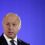 French Foreign Affairs Minister Fabius attends a news conference with US Secretary of State Kerry at the Quai d'Orsay Foreign Ministry after their meeting in Paris