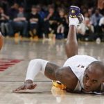 Los Angeles Lakers Kobe Bryant dives for a loose ball during their NBA game against the Chicago Bulls in Los Angeles