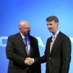 Microsoft CEO Ballmer shakes hands with Nokia's Chairman of the Board Siilasmaa during a Nokia news conference in Espoo