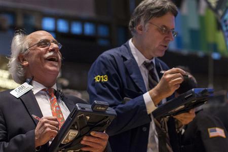 Traders work on the floor of the New York Stock Exchange