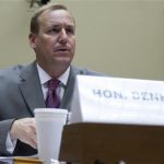 Handout photo shows U.S. Rep. Denham attending House Oversight and Government Reform Committee hearing in Washington