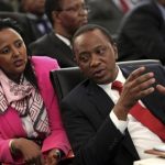 Kenyan President Uhuru Kenyatta chats with his Foreign Minister Amina Mohamed during the two-day meeting of SADC leaders in Pretoria