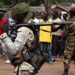 A Chad soldier holds his weapon in Bangui