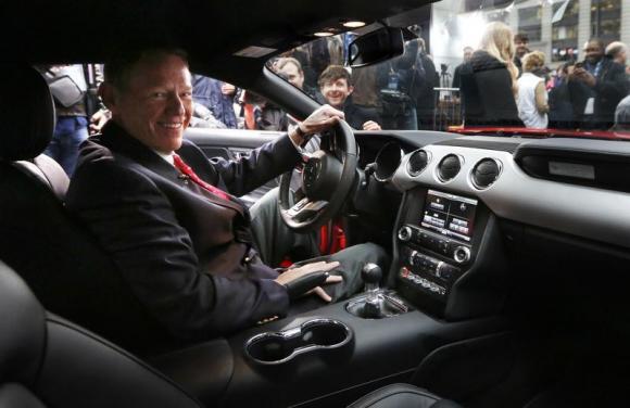 Ford Motor Co. CEO Alan Mulally sits in the driver seat of its all new 2015 Ford Mustang on ABC's Good Morning America in New York