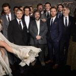 Cast and crew members pose at the premiere of the film "The Hobbit: The Desolation of Smaug" in Los Angeles