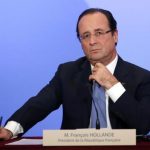 France's President Hollande attends a news conference at the Elysee Palace at the end of the Elysee Summit for Peace and Security in Africa, in Paris