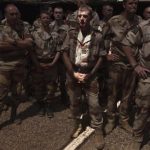 File photo of French soldiers waiting for France's Defence Minister Le Drian to arrive at a French military encampment at a Malian air base in Gao