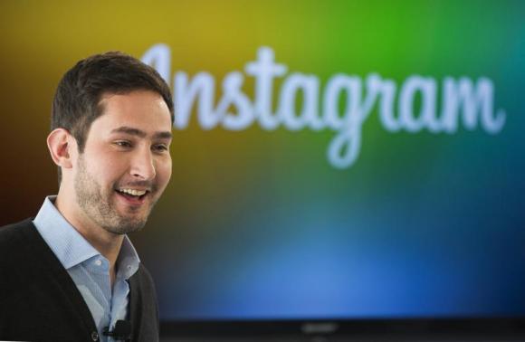 Instagram CEO and co-founder Systrom smiles during the launch of Instagram Direct in New York