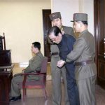 Jang Song Thaek is dragged into the court by uniformed personnel