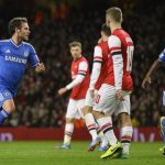 Chelsea's Mata celebrates scoring against Arsenal during their English League Cup fourth round soccer match at Emirates Stadium in London