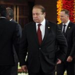 Pakistan's PM Sharif arrives for official photograph of Commonwealth heads of states during the CHOGM opening ceremony in Colombo