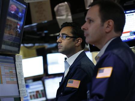 Traders work on the floor of the New York Stock Exchange