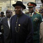 Nigeria's President Goodluck Jonathan arrives for the service for former South African President Nelson Mandela