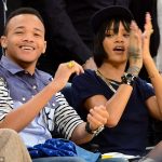 Rihanna and her brother Rajad loose themselves in the basketball game