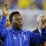 Soccer great Pele waves to the crowd before the international friendly soccer match between Brazil and Portugal in Foxborough