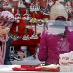 A free personalization promotion is seen inside a holiday-themed store in New York's