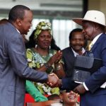 Uhuru Kenyatta ,Yoweri Museveni, right,