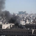 Smoke rises from the Defence Ministry's compound after an attack, in Sanaa
