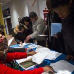 People attend a job training and resource fair at Coney Island in New York