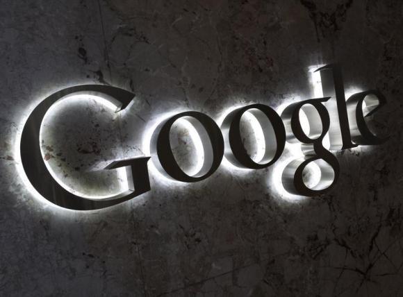 A Google logo is seen at the entrance to the company's offices in Toronto