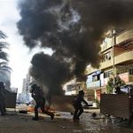 Egyptian security forces clash with supporters of ousted President Mohamed Morsi