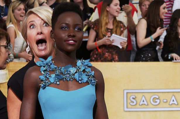 Emma Thompson blends into the background - Reuters
