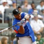 File photo of former MLB player Thomas hits a home run during the Legends and Celebrities All-Star softball game at Citi Field in New York