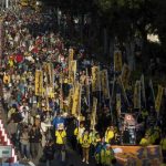 Thousands of pro-democracy protesters march in the streets to demand universal suffrage and urge Chun-ying to step down in Hong Kong