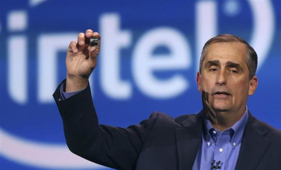 Intel CEO Krzanich introduces Intel's Edison, a new personal computer in the size of an SD card, during the annual Consumer Electronics Show (CES) in Las Vegas, Nevada