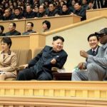 North Korean leader Kim Jong Un watches a basketball game between former U.S. NBA basketball players and North Korean players of the Hwaebul team of the DPRK with Dennis Rodman at Pyongyang Indoor Stadium